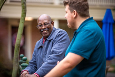 Caregiver And Resident Laughing