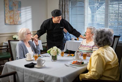 Chef talking with guests