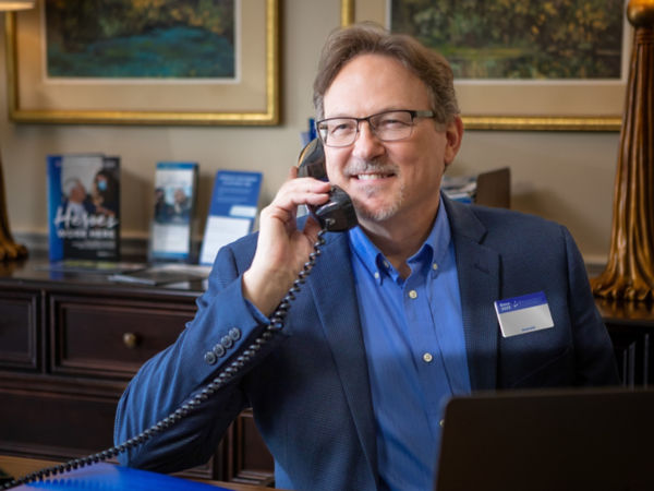 Executive Director Talking On Phone